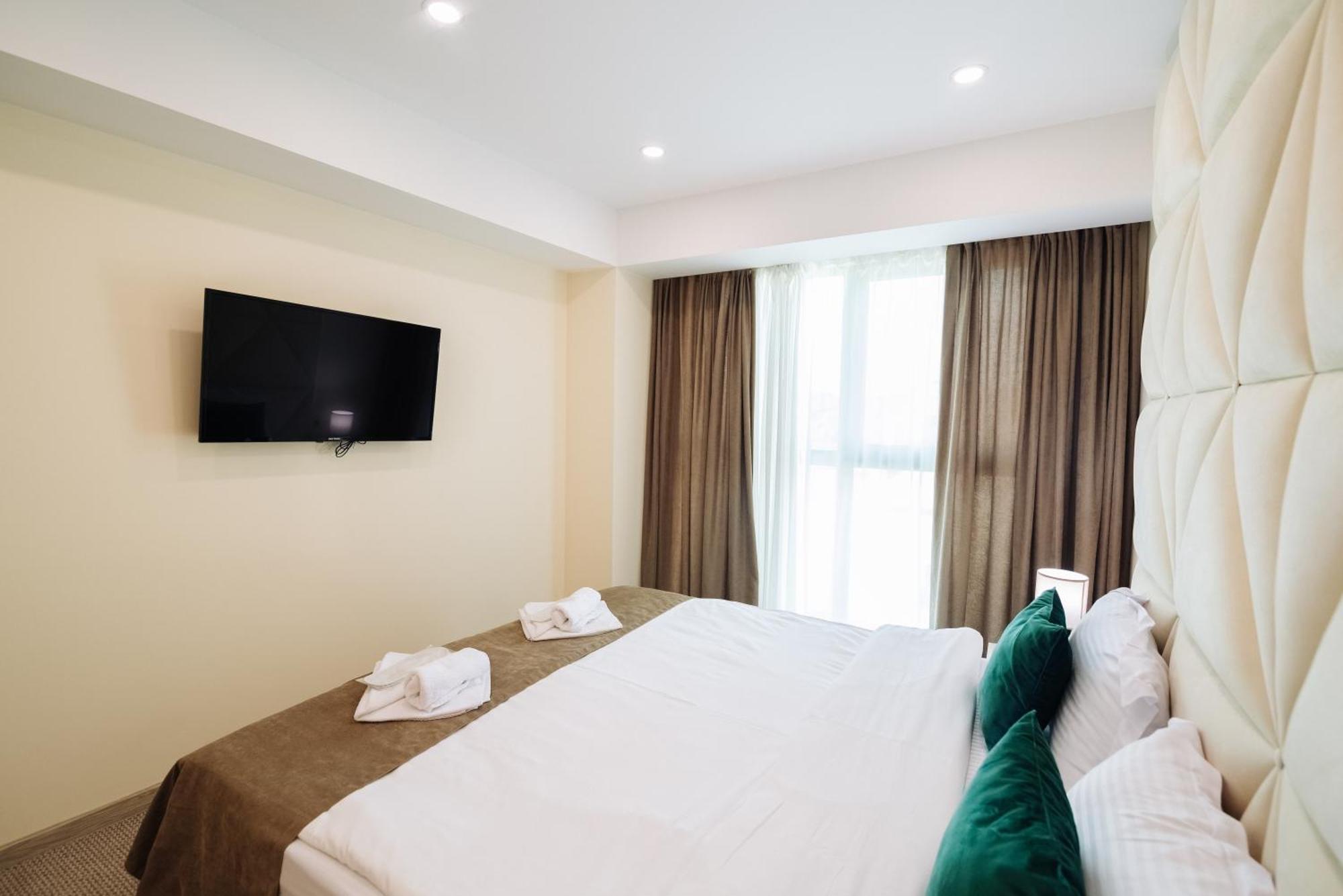 Royal Plaza Hotel Тбилиси Номер фото